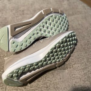 Mint green and light tan Nike’s